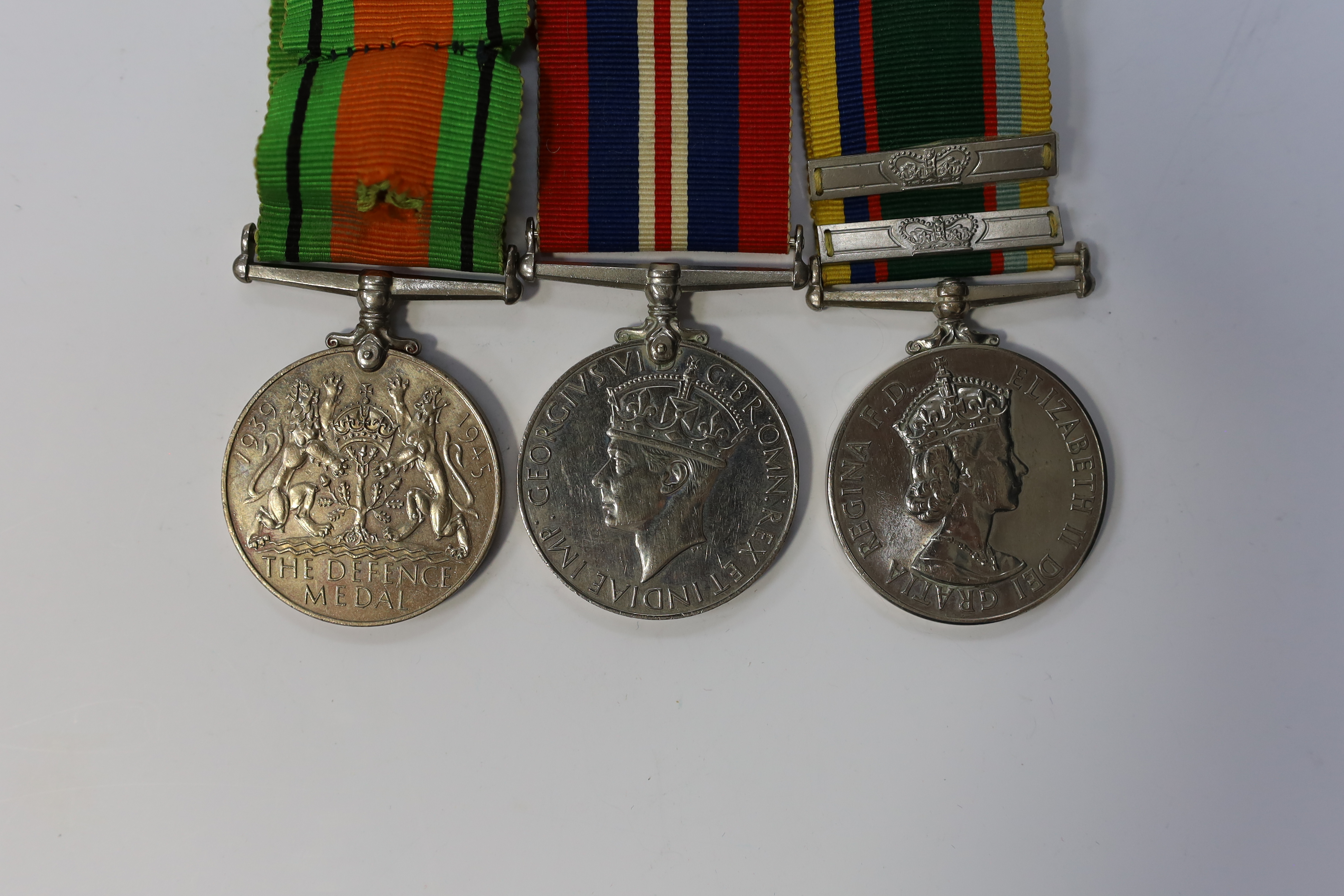 A group of assorted medals; WW2/ERII Cadet Forces medal group of 3 with two clasps to Fg.Off.W.K.Winstone R.A.F.V.R.(T); ERII RAFLSGC to Cpl B.K.Stockwell (F2570477) in box; WW2 Dm & WM. Condition - fair to good.